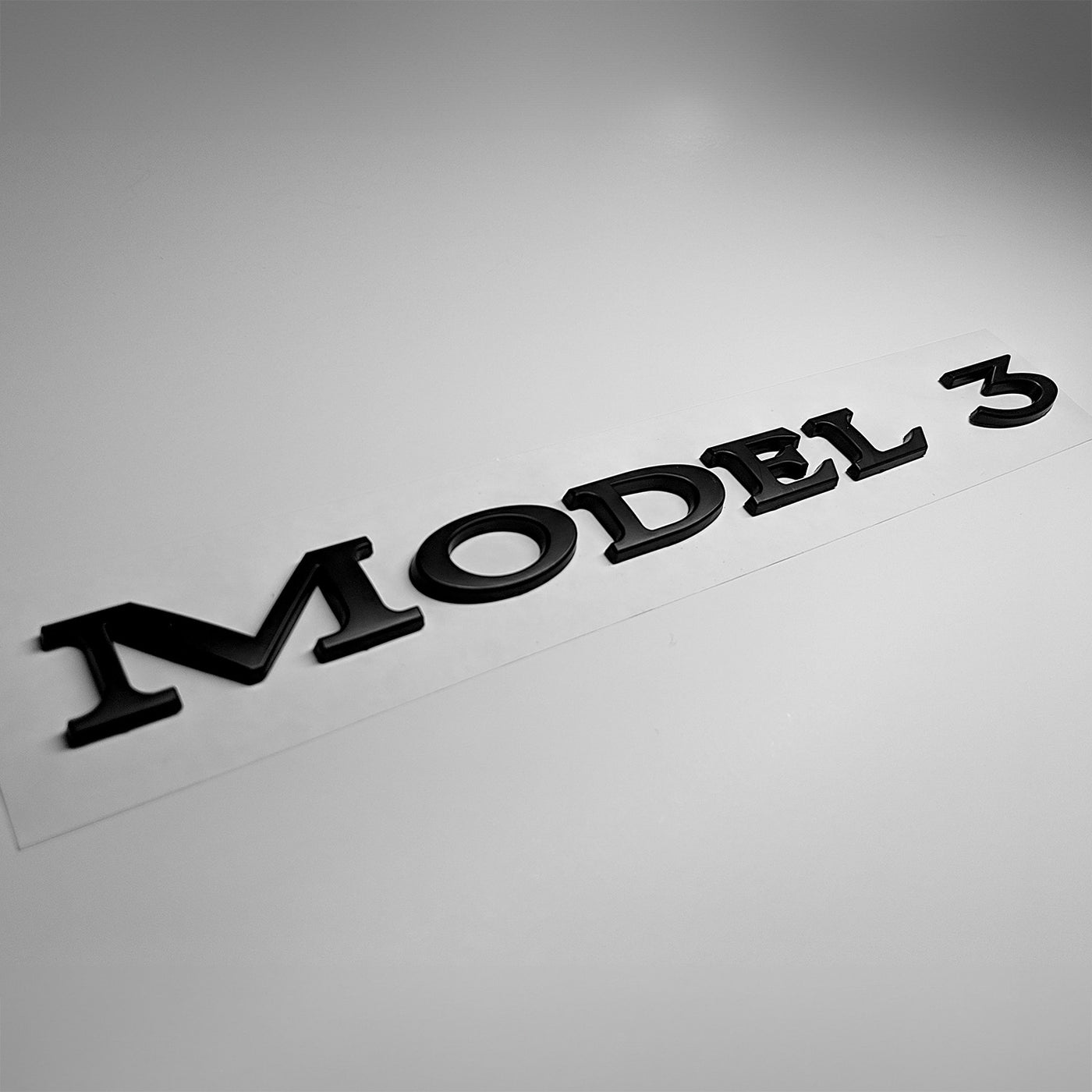 Model 3 Badge