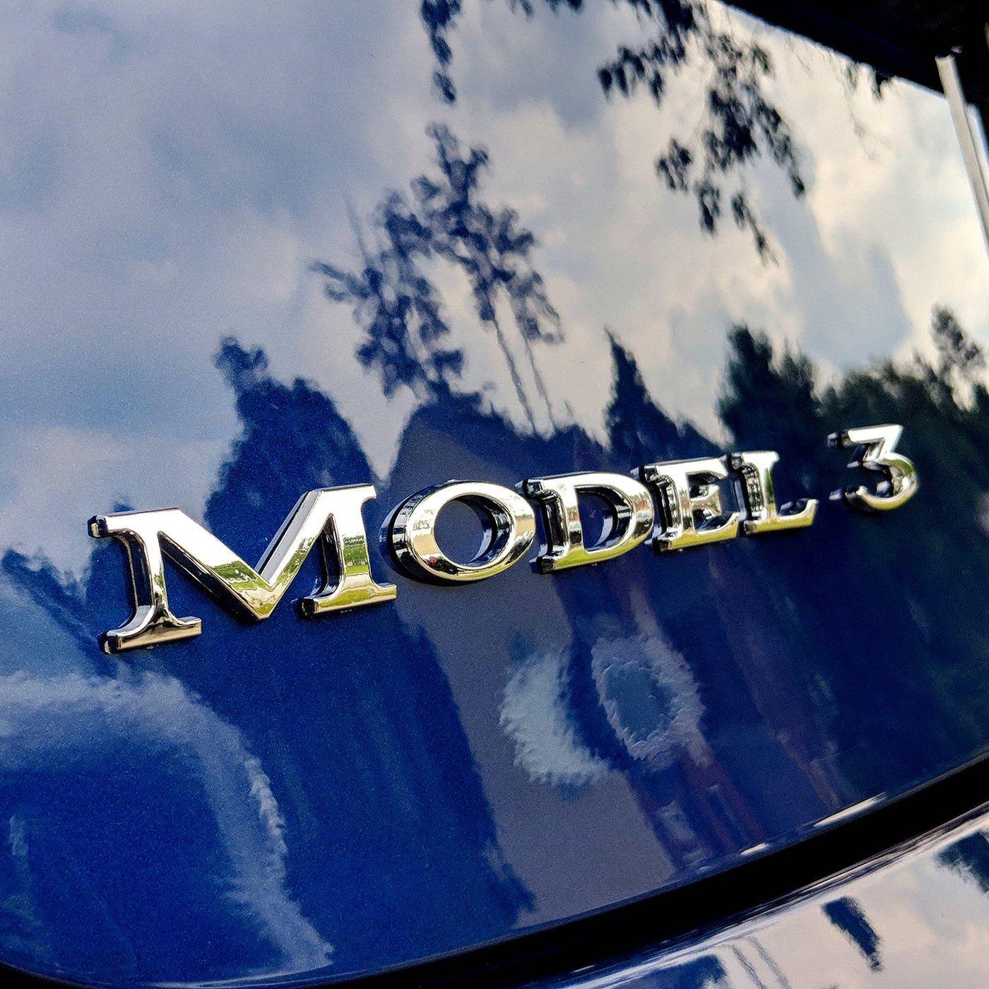 Model 3 Badge